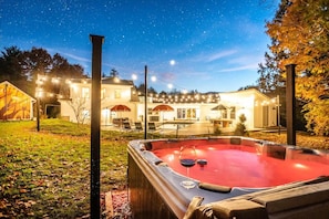 The luxurious hot tub is the perfect spot to soak away your stress. 