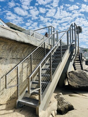 Brand New stainless steel staircase down the beach: double handrails and wiring for extra security while walking; stair treads slip-proof and drain water