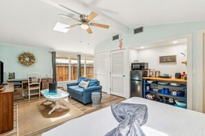 A room divider (not pictured) can be placed to provide a bit of separation between the bed and couch.