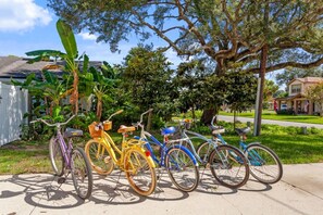 Beach cruisers, helmets, and bike pumps provided.