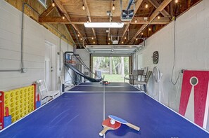 Game room that opens up to the backyard - enjoy that beach breeze!