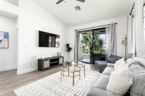 Enjoy a lake view from the living room. Ask us about premium cable and streaming services provided to you.