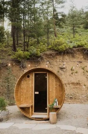 Outdoor sauna with backside mountain view
