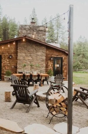 Outdoor fireplace and dining area