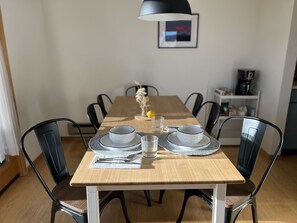The dining table seats 7-8 people comfortably