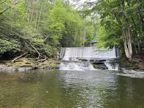 The waterfall at the swimming hole.
(With the blue bridge in the background)