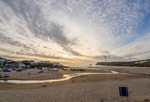 Enjoy an evening stroll along Polzeath Beach