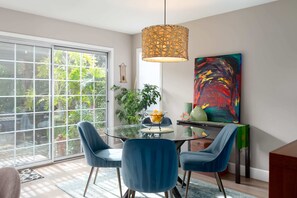 And speaking of the dining area, here's a closer shot of it. Again, charm and grace are the theme ... In the background, behind the sliding glass doors, is a beautiful back yard and gazebo. Patience, we'll get there shortly!