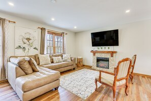 Living Room | Electric Fireplace | Smart TVs | Central Heating & A/C