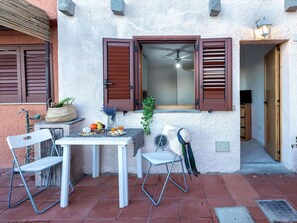 Table, Furniture, Flower, Property, Cloud, Sky, Plant, Building, Chair, Shade
