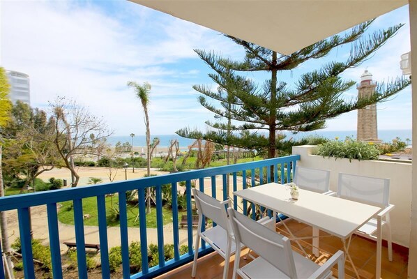 Lovely terrace with outdoor dining area for four guests and sea views