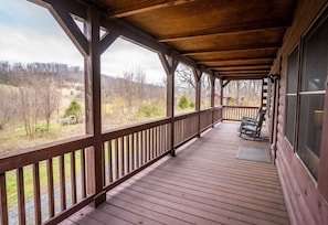 Enjoy mountain views from cabin's front deck