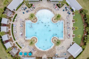 Access to a resort-style pool with poolside cabanas and loungers.