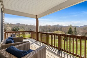 Enjoy sweeping views from this spacious deck.