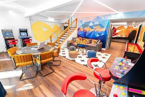Artsy game room modern artistic touches for entertainment and style.