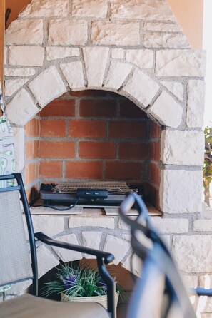 Beautiful terrace with barbecue

