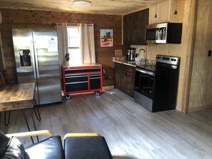 Kitchen - full-sized frig, range, microwave