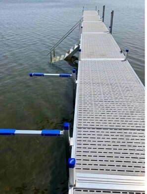 New aluminum dock system. Stairs to easily access the water and kayak rack.
