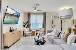 Living room with karaoke system and board games