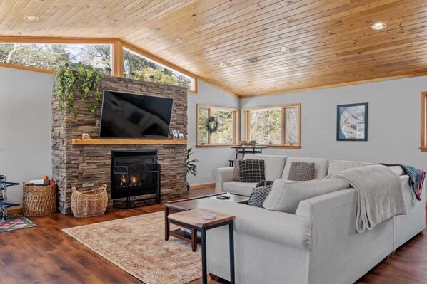 Entertainment and warmth combined! Our beautiful flat-screen TV and stunning fireplace create the perfect cozy atmosphere