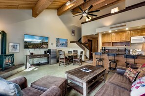 Furniture, Indoors, Living Room, Couch, Table