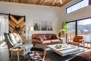 Cozy seating in main level living room with incredible views