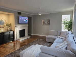 Cozy family room with smart TV (first level)