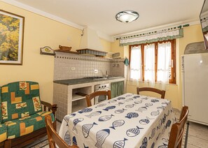 table in the living room-Casa Verde-Elba Island