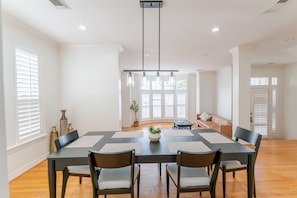 The formal dining space accommodates seating for six.