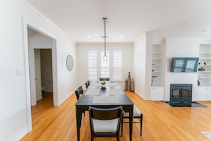 The formal dining space accommodates seating for six.