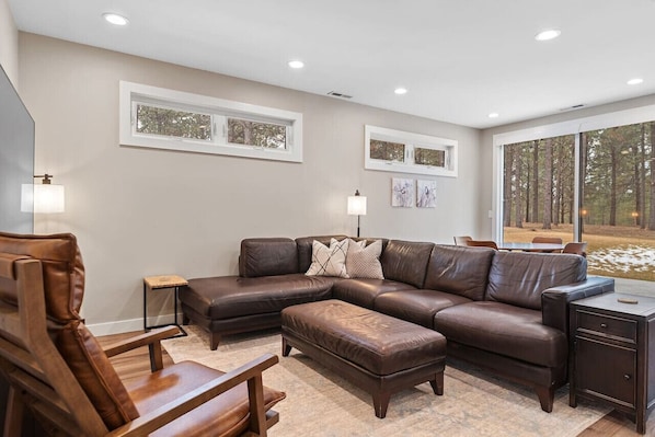 Step into our inviting living room, where plush sofas provide ample seating to unwind and enjoy each other's company in comfort and style.