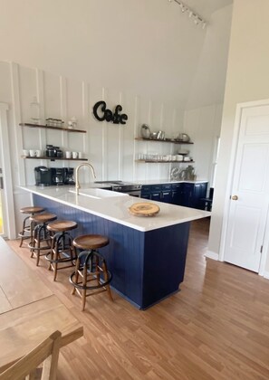 Renovated kitchen with quartz counters