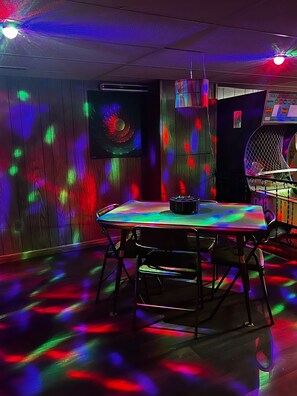 Basement dance floor/gaming table area