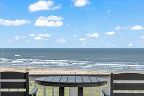 Top floor deck: panoramic views of the Gulf, bar chairs and tables.