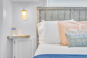 Cozy up in crisp linens and coastal charm — because beach life is the best life.