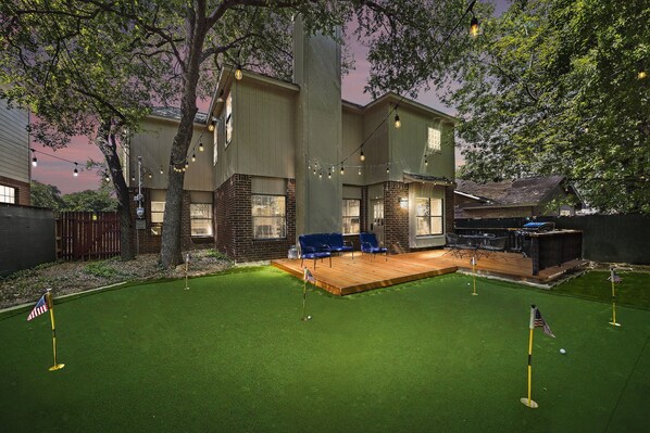 Unique mini-golf in backyard for ultimate level of entertainment.
