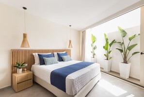 Downstairs bedroom with garden view.