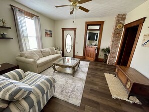 Living room with sleeper sofa and toy chest