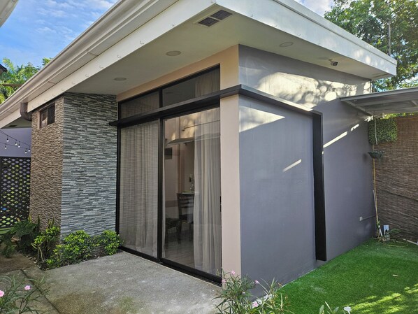 entrance area thru patio door, secure gate entry to property