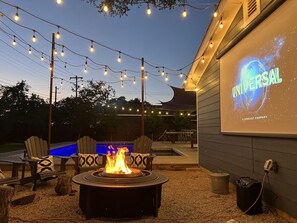 Watch movies outside by the firepit