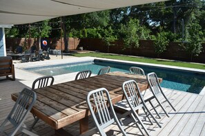 The outdoor dining table with seating for eight