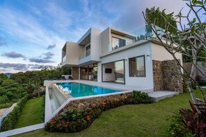 "Tranquil garden oasis with a pool to refresh and rejuvenate."