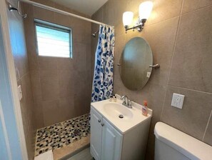 Enjoy a hot shower with excellent water pressure in our newly renovated bathroom