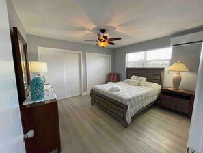 Queen-size bed with new mattress added in December 2024. Blackout shades. 