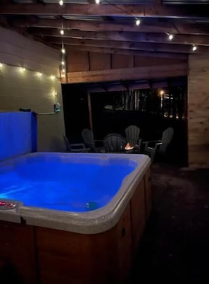 Covered hot tub and smokeless fire pit.