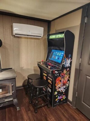 Arcade game with classic Nintendo, Sega, and Atari games.
