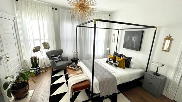 Master Room with original Art & Antiques.