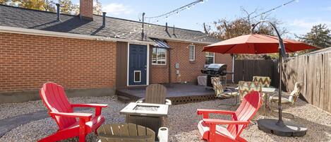 Relax by the firepit, BBQ, or play cornhole in this fenced yard!