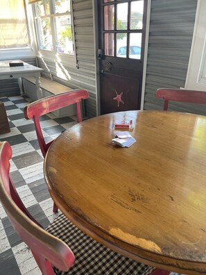 Keep a game of cards going at one table and a puzzle at the other!