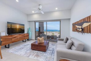Rest and unwind in this stylishly decorated, cozy living room with perfect island views!